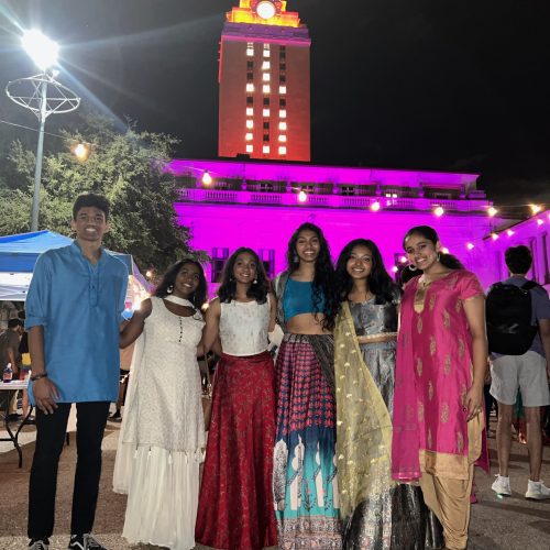 HUM members in front of the UT Tower