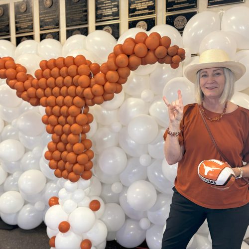 Longhorn balloon arch at a McCombs welcome event