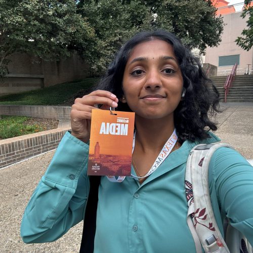 Ananya with a McCombs brochure